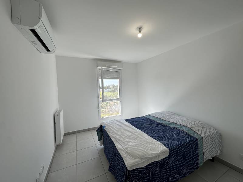 Apartement T2 1er étage dans résidence récente avec stationnement et climatisation réversible 13127